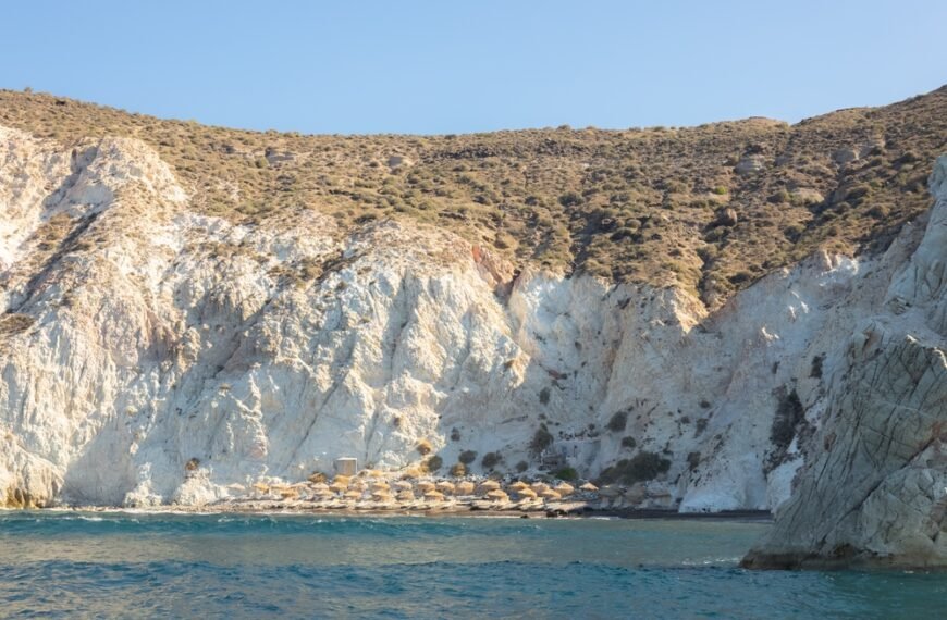 The,Secluded,White,Beach,And,Volcanic,Rock,Formation,Along,The